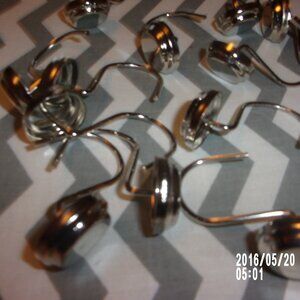 SHOWER CURTAIN HANGERS